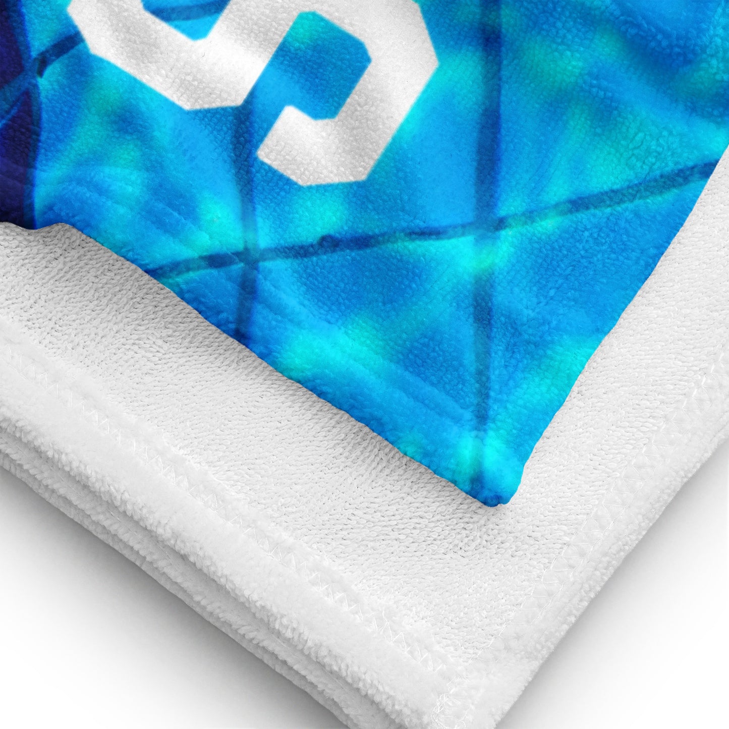 Close-up of United We Swim towel fabric texture