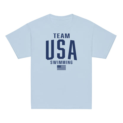 Team USA Swimming Patriotic Youth T-Shirt in light blue with navy text. Classic light color tee for active kids in swim communities.