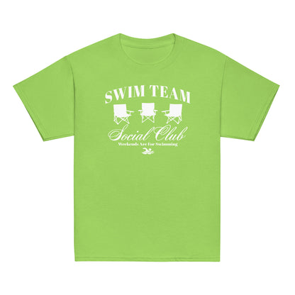 Lime green Swim Team Social Club Youth T-shirt by TrendySwimmer featuring white foldable chairs and swim lifestyle slogan.