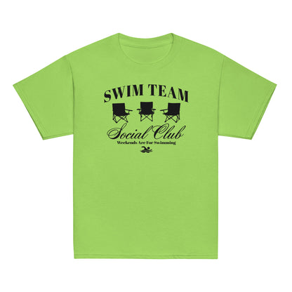 Swim Team Social Club Youth T-Shirt in light green featuring black foldable chair graphic. Great for kids who love swimming and team spirit.