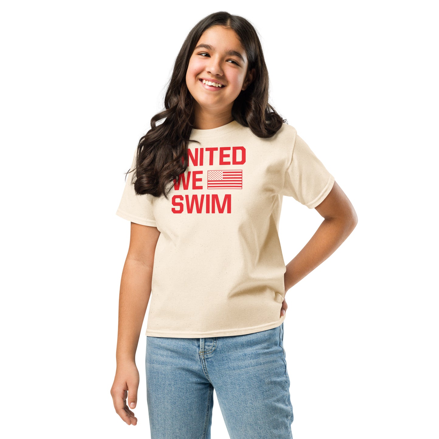 Smiling girl wearing United We Swim Patriotic Youth T-Shirt in light beige. Comfortable and stylish tee for active kids who love swimming.