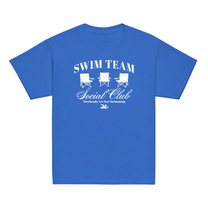 Royal blue Swim Team Social Club Youth T-shirt by TrendySwimmer with white graphic of three foldable chairs and swim-themed text.