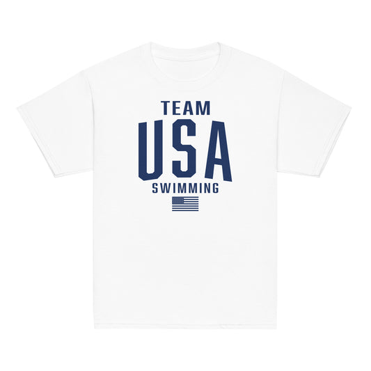 Team USA Swimming Patriotic Youth T-Shirt in white with bold navy text and American flag graphic. Lightweight tee for kids' swim pride and comfort.